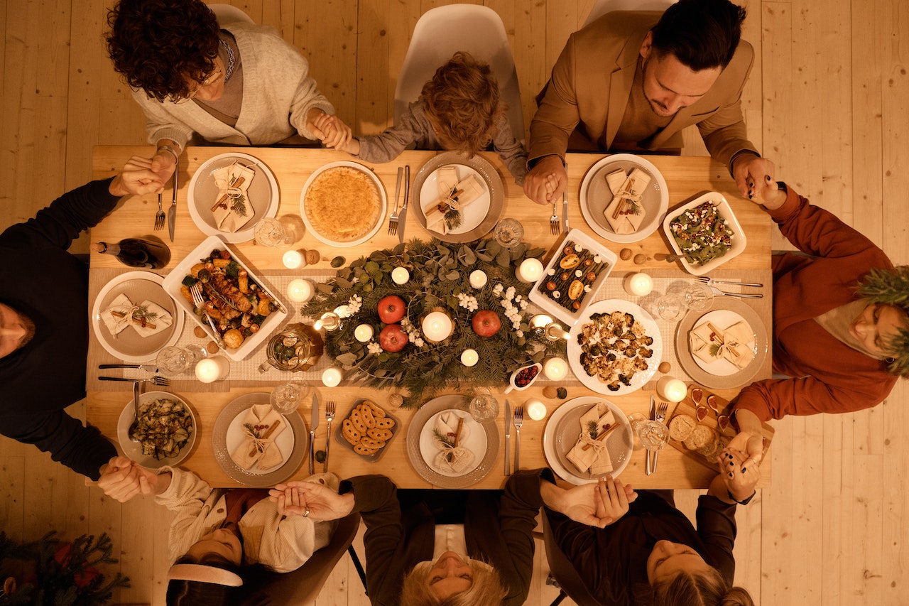people gathered having dinner