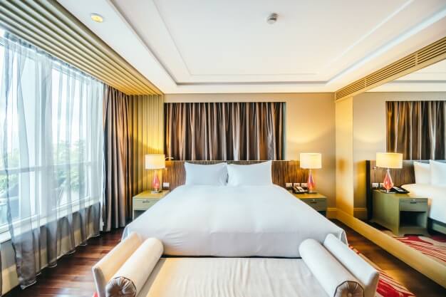 bedroom windows with thick drapes