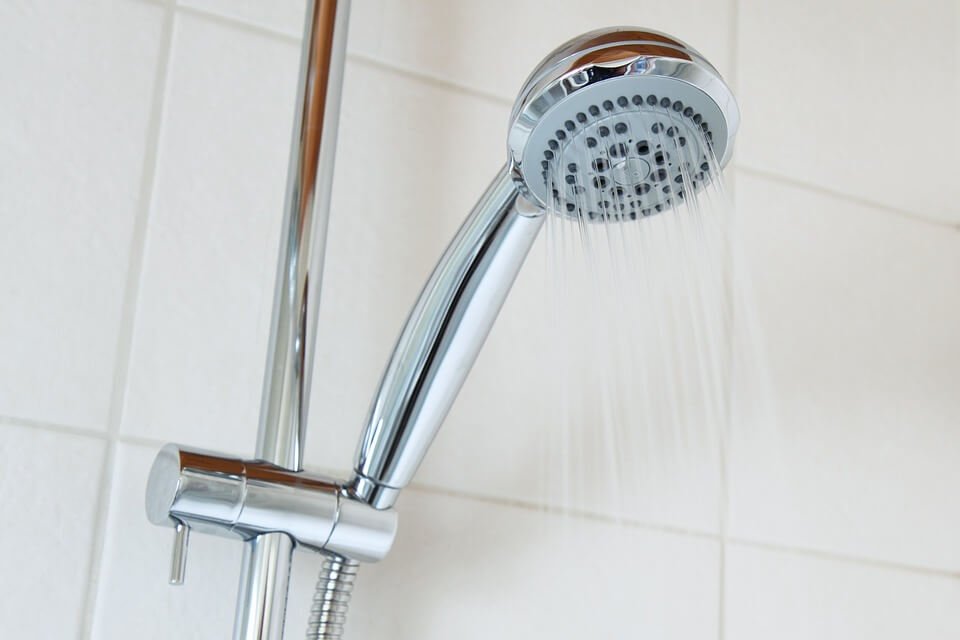 shower with adjustable nozzle