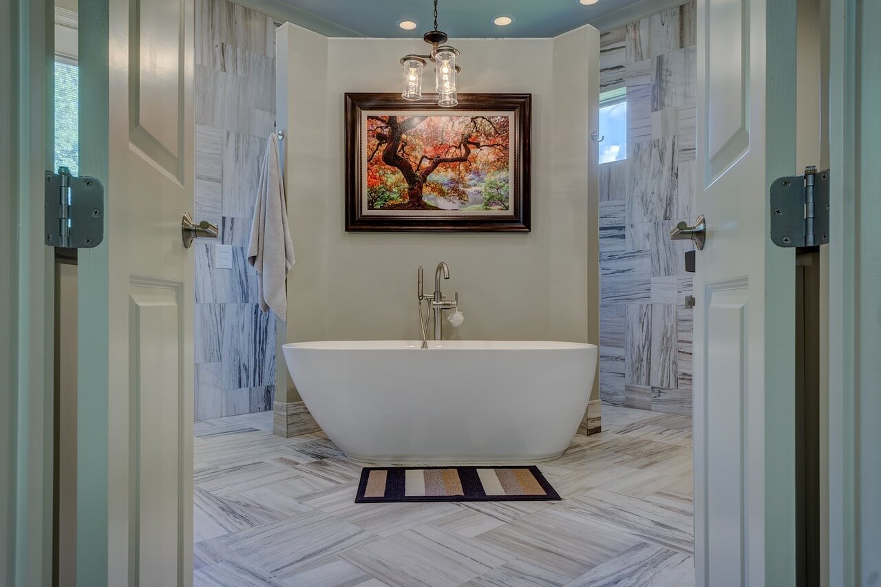 bathroom wall decorated with a painting