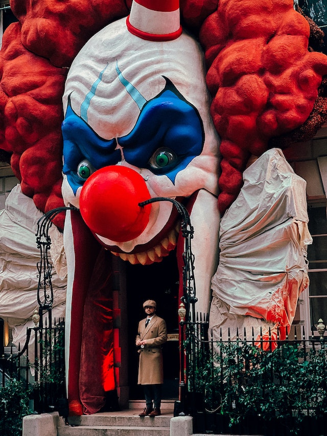 Spooky clown decoration in front yard