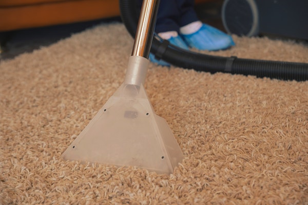 vacuum cleaning carpet