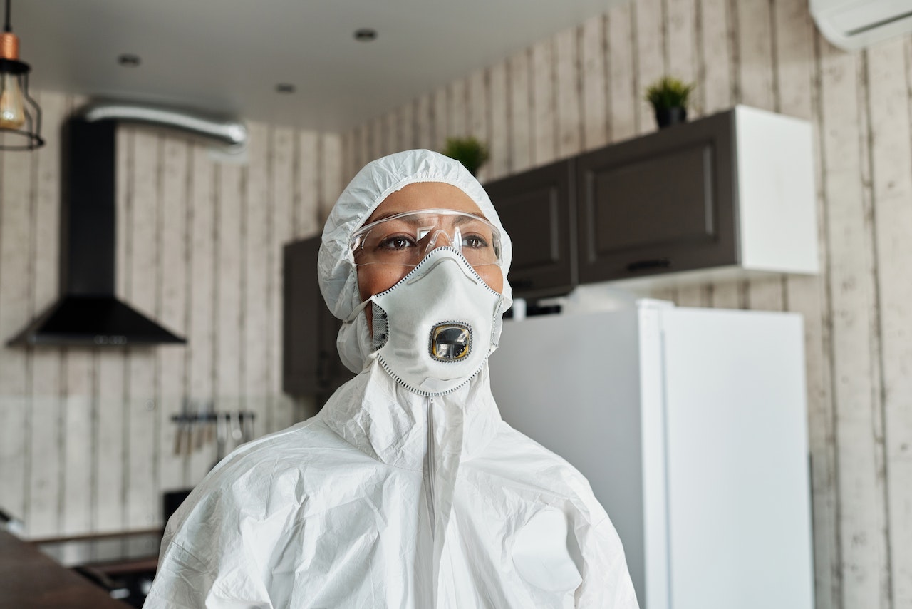 Woman in cleaning suit