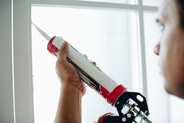 caulking a door