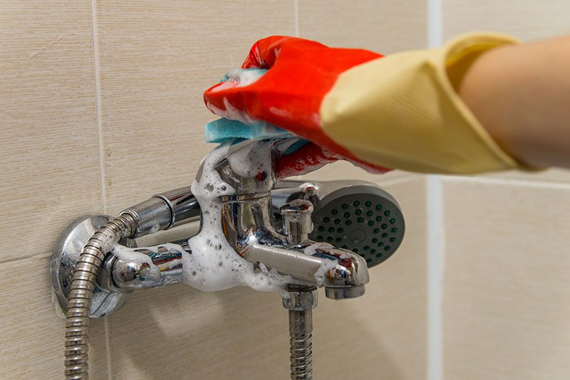 clean calcium deposits in plumbing