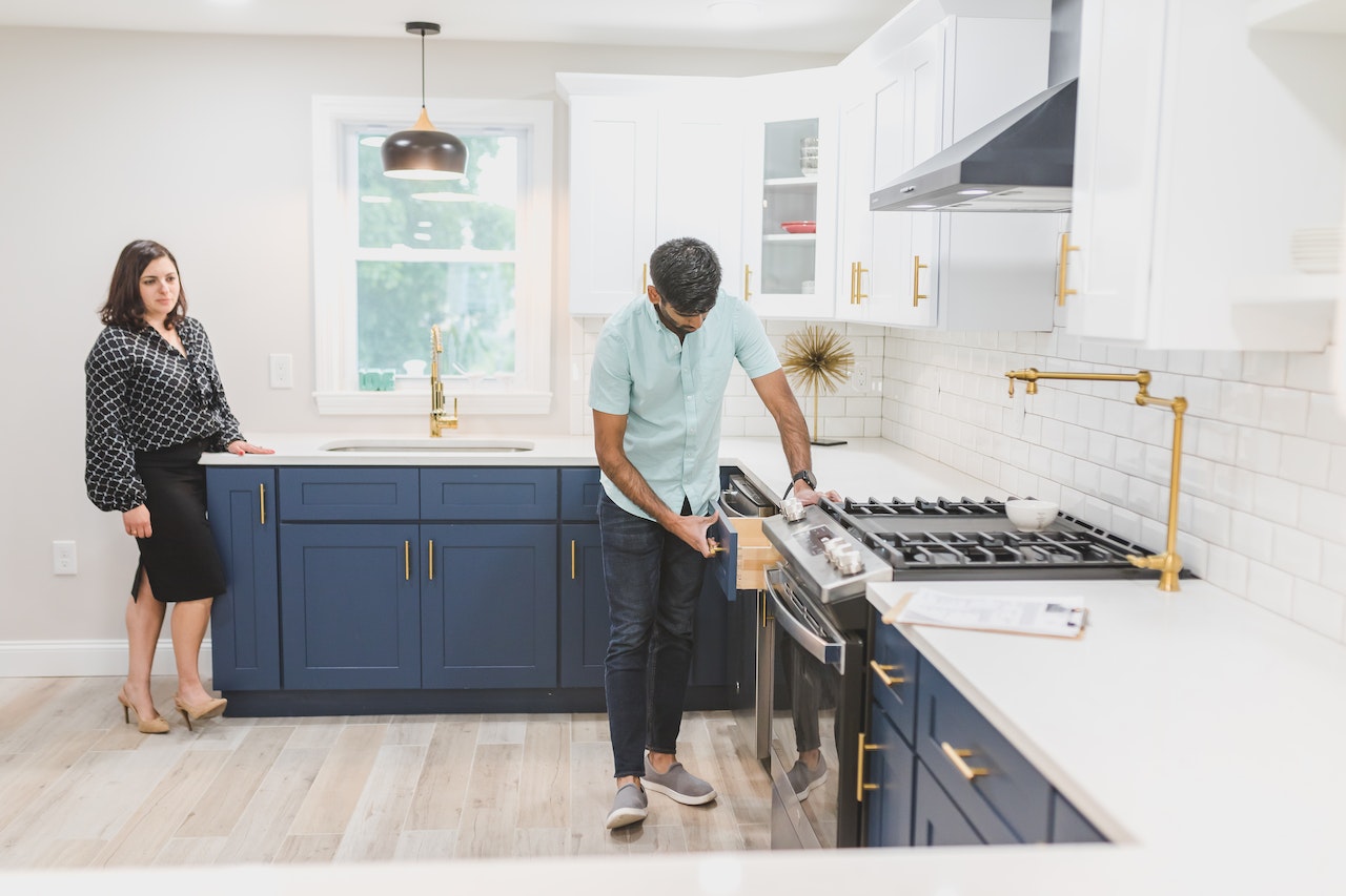 Inspection of kitchen cabinets and stove