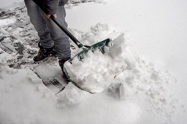 salting snow in driveway