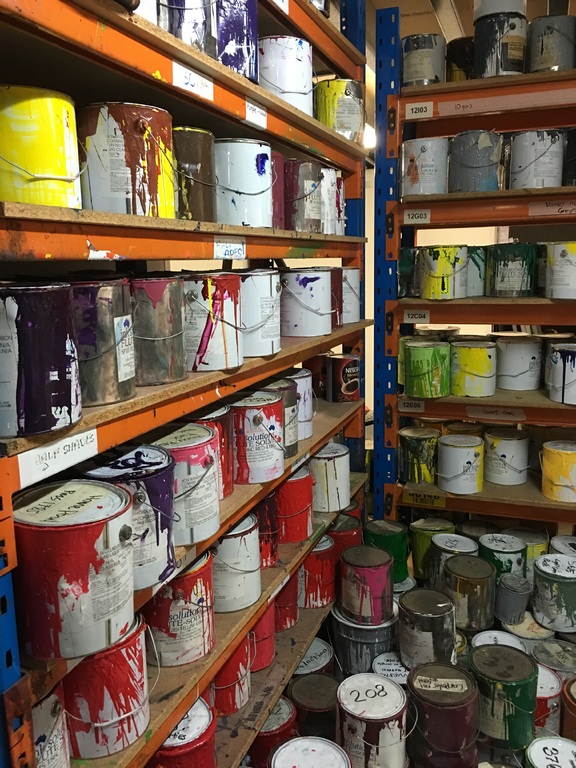 shelf with paint pots