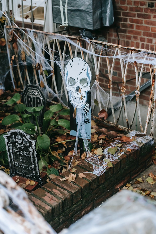 Front yard decorated with spooky signboards