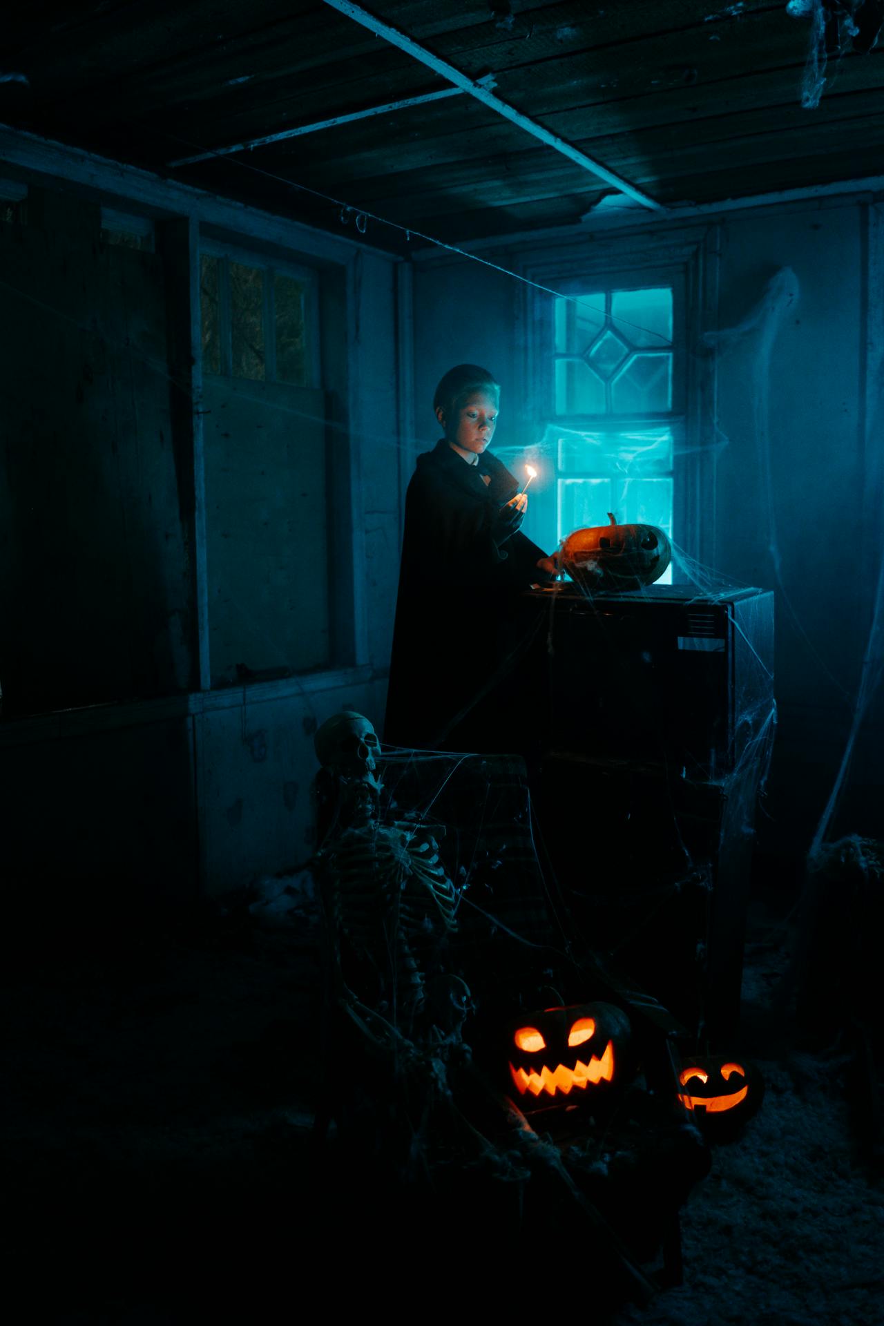 Halloween decoration - boy with a lit match