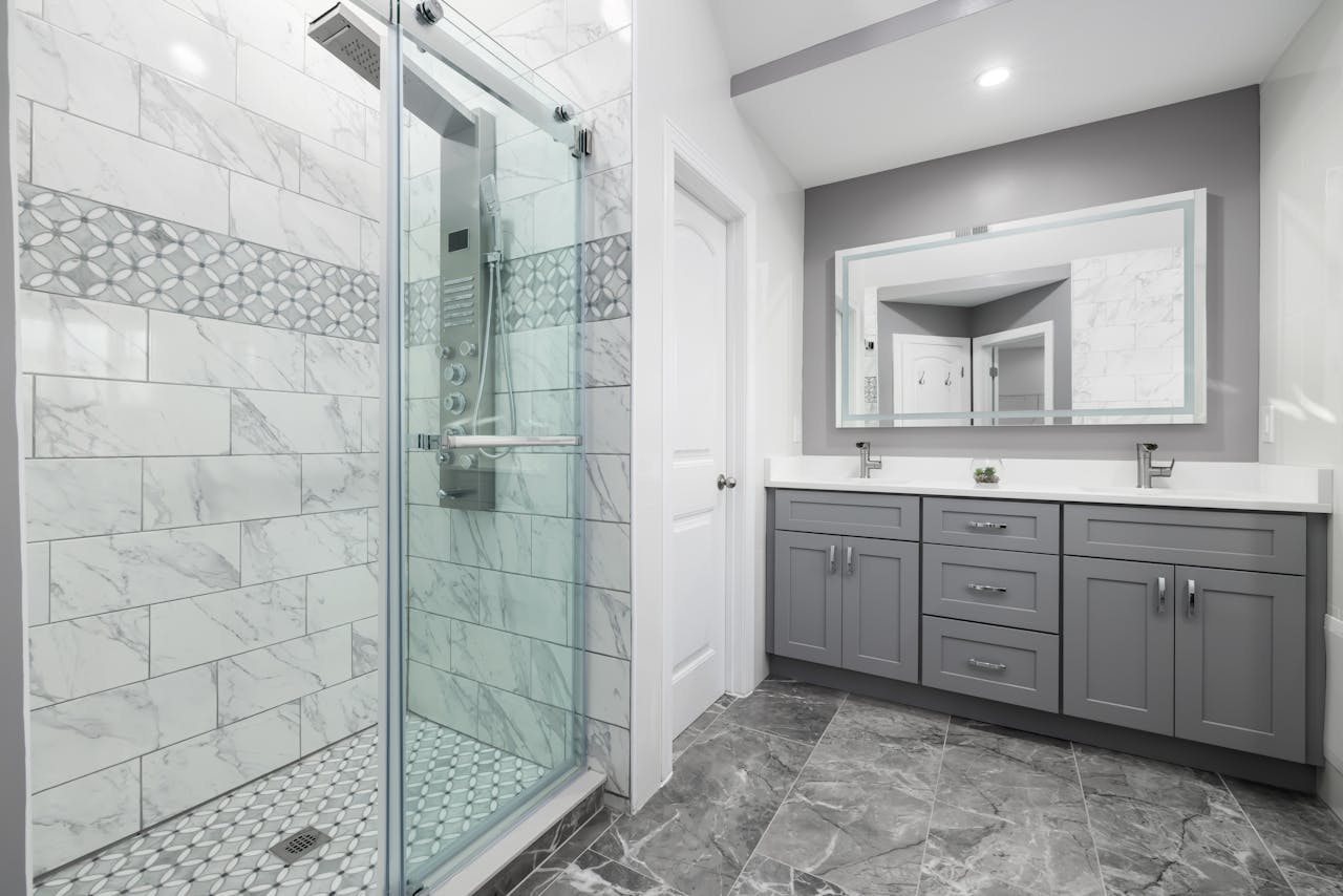 bathroom with Gray panel cabinets