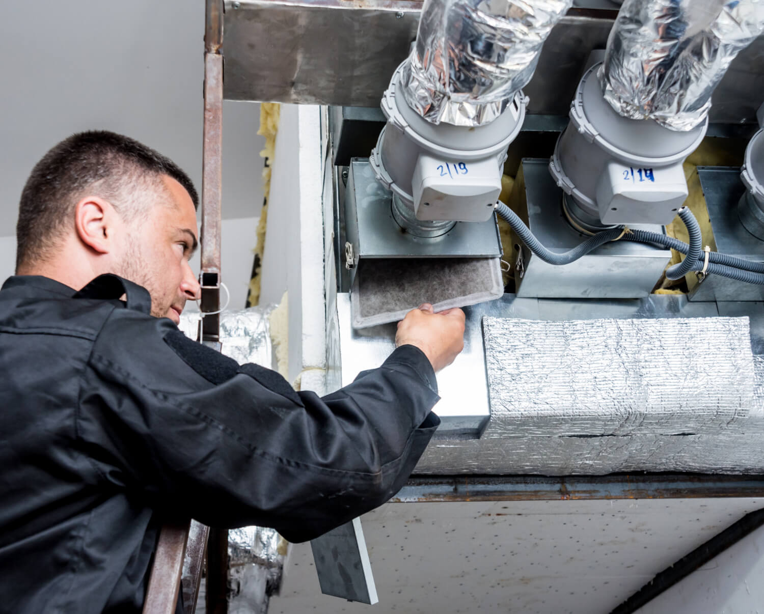 Ventilation cleaning. specialist at work. repair ventilation system