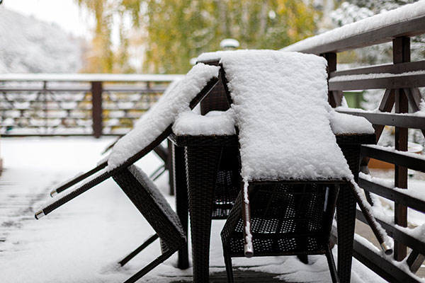 patio furniture in snow