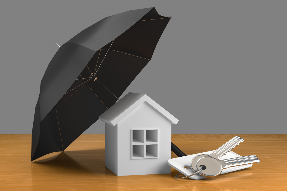 tiny white house with umbrella and papers