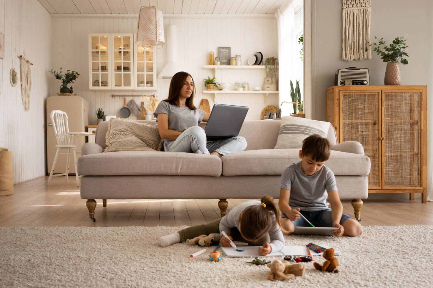 family at home: mom and kids playing
